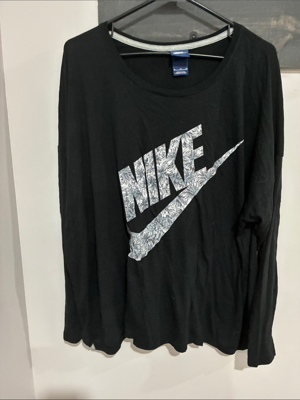 Nike Black Long-Sleeve Tee with White Patterned Logo